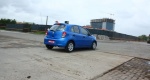 2011-Nissan-Micra-for-India-Panning-Rear-Three-Quarter